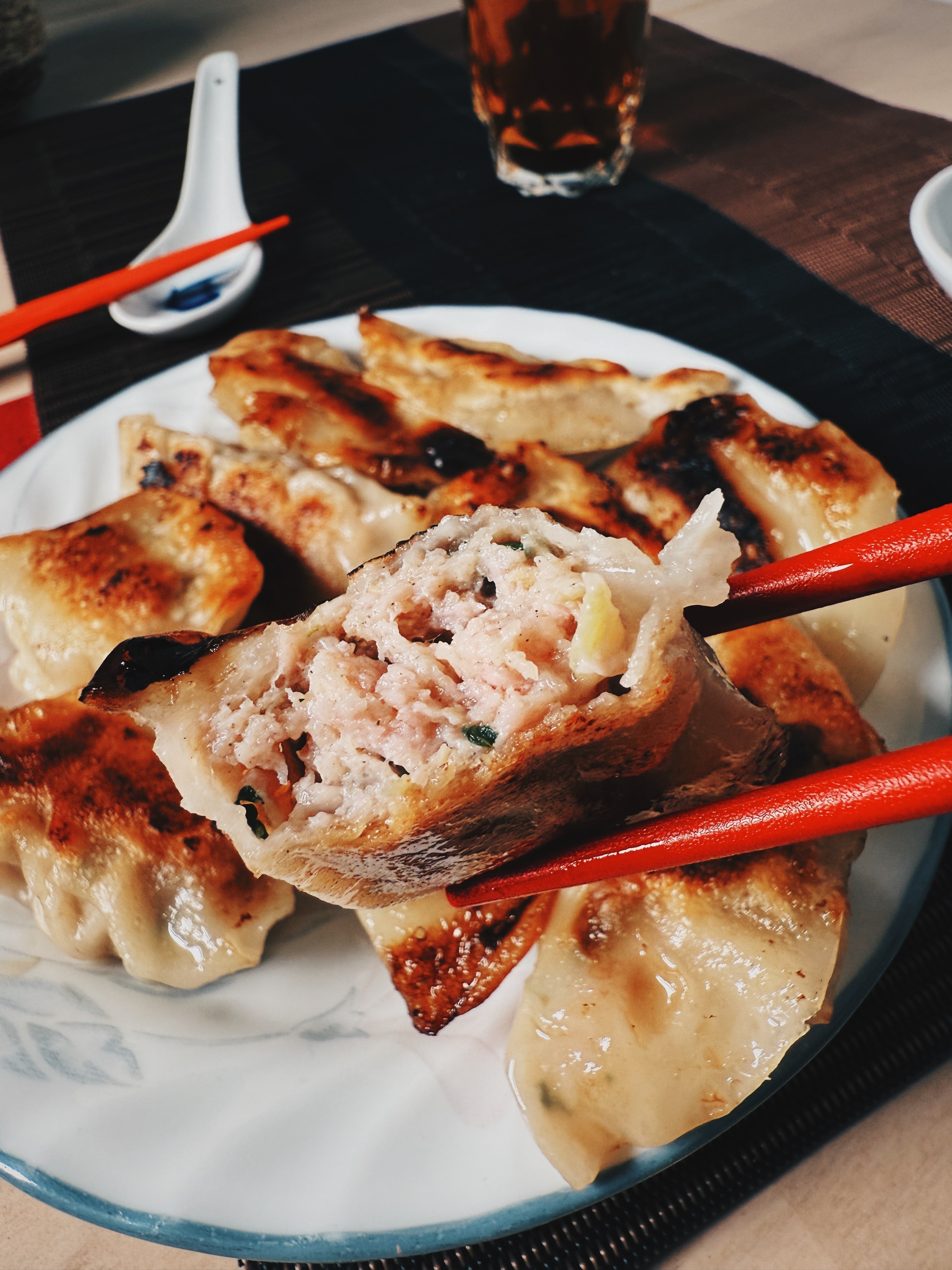 Close-up of perfectly cooked frozen gyoza with crispy bottom and juicy filling